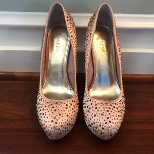 Baker’s pink satin and brown rhinestone pumps